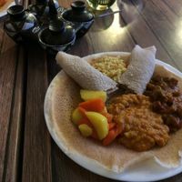 Mix of vegan dishes on typical bread.  at Saron in Heidelberg