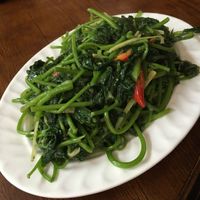Morning glory in a sauce from fermented bean and ginger. Delicious!  at Fuyue Xianju Vegetarian Restaurant in Macau