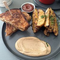 Sweet potato grilled cheese and side potato wedges.   at Shine Plant Based Kitchen in Orillia