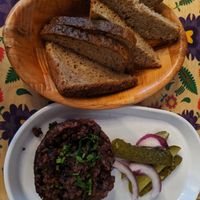 Fried black pudding with bread. at Vege Bistro - Polish Vegan Food in Warsaw
