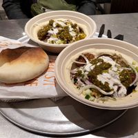Falafel hummus bowl with pita at Naf Naf Grill in Chicago
