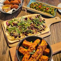 Bitterballen (€9,50) dumplings (€10,50) Flammkuchen bieten (€12,50) en corn ribs (€9) at Rebel Rebel in Dordrecht