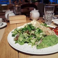 Green salad with avocado, alfalfa roots, onion, cherry tomatoes etc.

Amazing salad! at Yi in Athens