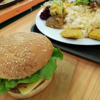 Burger and menu plate at Mennyorszag Szive in Budapest