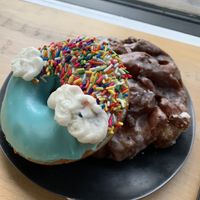 Pride month doughnut and an Apple fritter at Guru Donuts in Boise