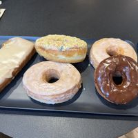 Maple bar, two original glazed, chocolate impossible (vegan, GF), Alice in wonderlandd  at Guru Donuts in Boise