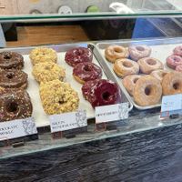 I circled where they denote if it’s vegan or not. Very small and in the corner. They had many options on 5/9/26  at Guru Donuts in Boise