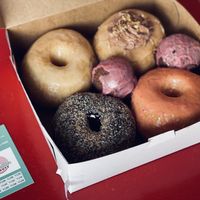 Original glazed, chocolate peanut butter bomb, strawberry lemonade, chocolate coconut, raspberry chocolate nibbler  at Destination Donuts in Columbus