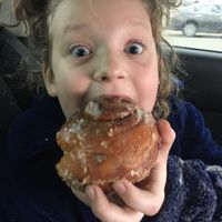 Happy kid at Destination Donuts in Columbus