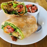 Falafel wrap (missing one bite!). at Urban Farm Cafe in San Isidro De El General