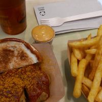 Currywurst meal with iced tea at VINCENT - Europa Passage in Hamburg