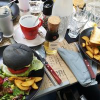 Vegan Burger (left) opted with salad instead of fries at Crop in Crete