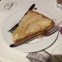 Vegan lemon tart topped with pear slices at Spinno in Palermo