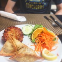 Sharing starters: onion bhaji and veg samosa  at Indian House in Funchal