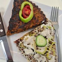 Quiche (second type) and pizza with vegan sausage at Loving Hut in Sofia