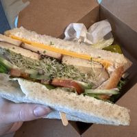 veggie sandwich w veganaise, violife cheddar, marinated tofu & all the veggies on sourdough bread  at Skagit Valley Food Co-op in Mount Vernon