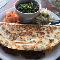 The soyrizo / potato quesadilla, accompanied by pico de gallo, black beans and chopped lettuce. at Crossroads Cafe in Joshua Tree
