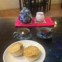 green tea from plants over 100 years old.. Stored for 10years served with sesame seed bun at Yun Shan Ge Vegetarian House - Penang St in Penang