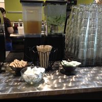 condiment counter with cucumber water & tea at Nourish in Tempe
