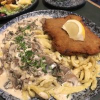 Schnitzel with Swabian Spätzle and mushroom cream   at Cafe Rost in Mannheim