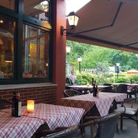 Outdoor area at La Malga Ristorante Pizzeria Vinoteca in Berlin