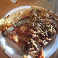 Pig destroyer destroyer and the buffalo chickpea pizza at Apiecalypse Now Pizza and Snack Bar in Toronto