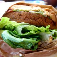 Sweet Potato and Black Bean Burger (to go) :
Sweet potato, organic black beans, corn, peas, carrots, lettuce, guacamole, buschetta, Vegenaise.

It's pretty good. at Copper Branch - Rene Levesque in Montreal