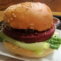COPPER BURGER. Beet, lentils, organic brown rice, maple syrup, Dijon vegenaise, organic miso, caramelized onions, alfalfa sprouts, lettuce.

This burger is pretty good. at Copper Branch - Rene Levesque in Montreal
