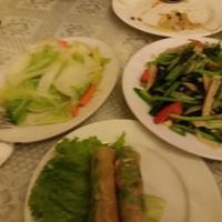 Summer rolls, fresh vegetables and fried noodles. at Loving Hut - Chua Lang in Hanoi