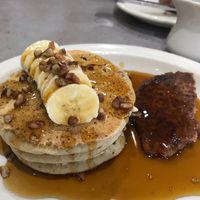 Banana pecan pancakes with 1/2 a sausage patty at The Bossy Hen in Myrtle Beach
