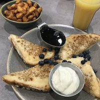 Vegan French toast with potatoes and OJ at Hot Stacks Cafe in Myrtle Beach