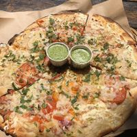 Vegan pie with their green salsa  at Cheeseboard Pizza in Berkeley