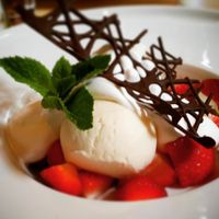 Soy ice cream with fresh strawberries and whipped soy cream :D at The Green Room in Gothenburg