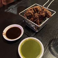 Vegetable pakodas with mint and tamarind chutneys  at Moksha Indian Bistro in Niagara Falls