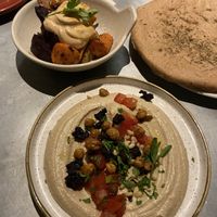 Hummus y patatas bravas at Teresa Carles Cocina Vegetariana in Barcelona