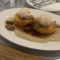 Try this! Peach dessert    at Teresa Carles Cocina Vegetariana in Barcelona
