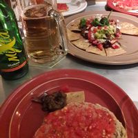 Starters nachos and tomatoes on bread.  at Teresa Carles Cocina Vegetariana in Barcelona