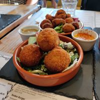 Risotto and fried pickles behind that at Anna Loka in Cardiff