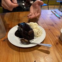 Chocolate dodge cake with ice cream. With warm drizzling sauce ♥️   at Anna Loka in Cardiff