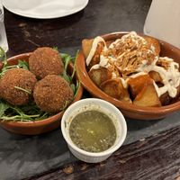 Arancini (left), great. Patatas bravas (right) sublime   at Anna Loka in Cardiff