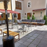 Outdoors seating area in the back at Legume in Uppsala