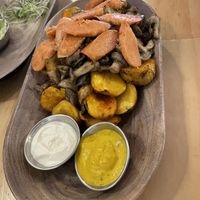 Champi papas with sausages  at El Jardín de Jazmín in Lima