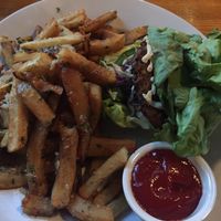 Vegan burger (wrapped in lettuce as bun not vegan) and fries at The Federal Bar in Long Beach