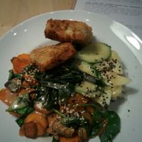 fried vegetables with cardamon-jasmine rice with cucumber and kohlrabi salad, sesame oil and coconut vinegar dressing and crispy wasabi tofu at Zyzna in Wroclaw