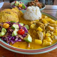 Cotopaxi - potatoes and oyster mushrooms in a creamy and mildly spiced sauce, with rice, side salad and fried plantain tostones. This was under $6!  at Mishqui Quinde Sweet Hummingbird in Mindo
