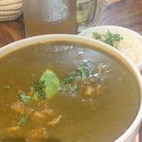 Vegan Encebollado with the local signature drink  at Mishqui Quinde Sweet Hummingbird in Mindo