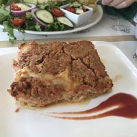 Lasagna with a soy ragú, oily, soggy, blend  at Universo Vegano in Florence