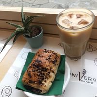 Vegan Iced coffee and vegan chocolate croissant yummm at Universo Vegano in Florence