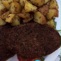 Patate e vegan burger at Universo Vegano in Florence