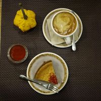 Cake and cappuccino we ordered at Bhajan Cafe in Riga